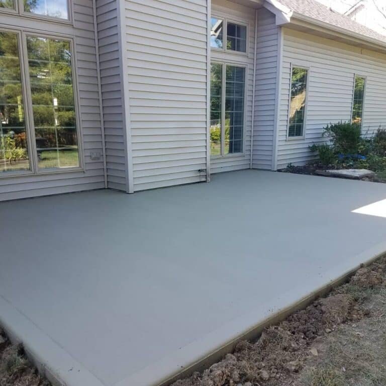 Freshly poured broom-finished concrete patio in Paulding, Ohio.