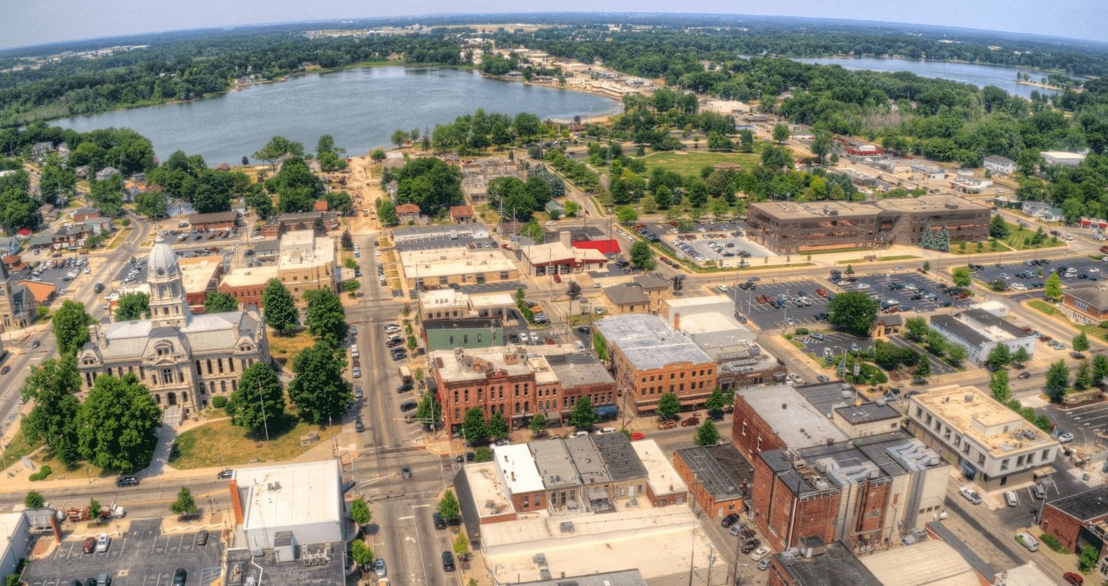 Aerial view of downtown Warsaw, Indiana, with the Kosciusko County Courthouse and Center Lake