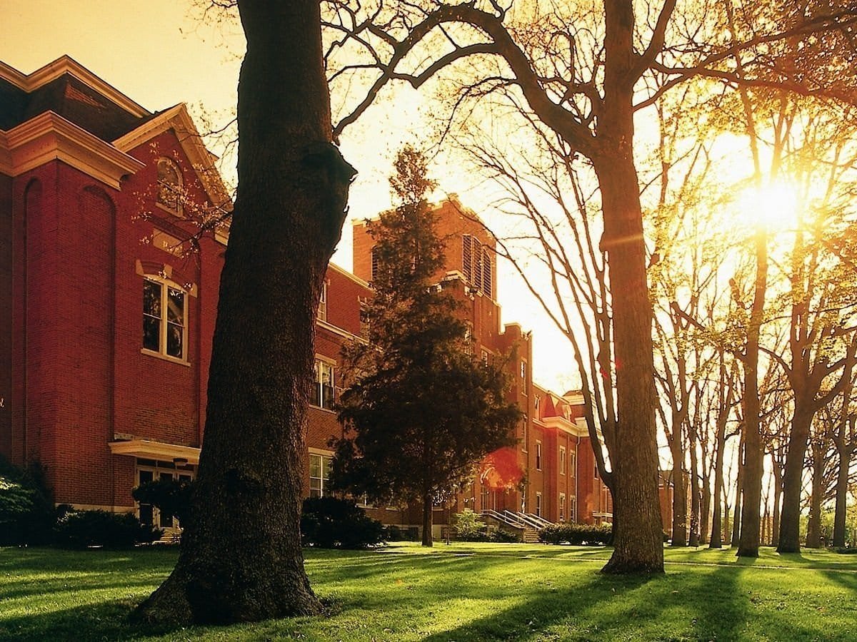 Historic red brick buildings and trees in North Manchester, Indiana